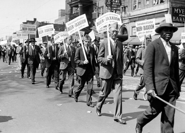 The Great Depression struck the final blow against Prohibition. Here, marchers in Detroit bear signs reading, "Beer for Taxation, Jobs for #sign #beer #vintage #prohibition