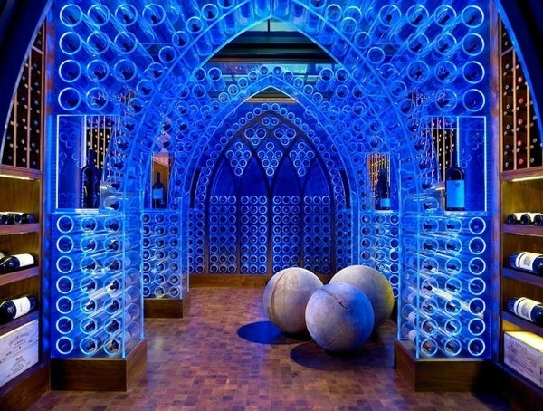 Wine Cellar with artistic lighting of wine racks in blue #interior #house #artistic #decor #art #paintings #residence