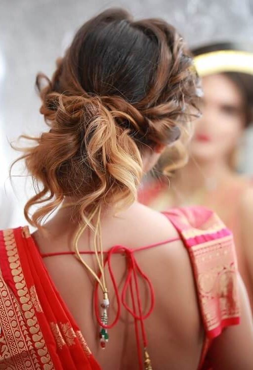 Casually Tied Curly Mid Bun