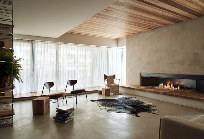 Loft Living Space Blending Organic Design and Industrial Style Accents - InteriorZine