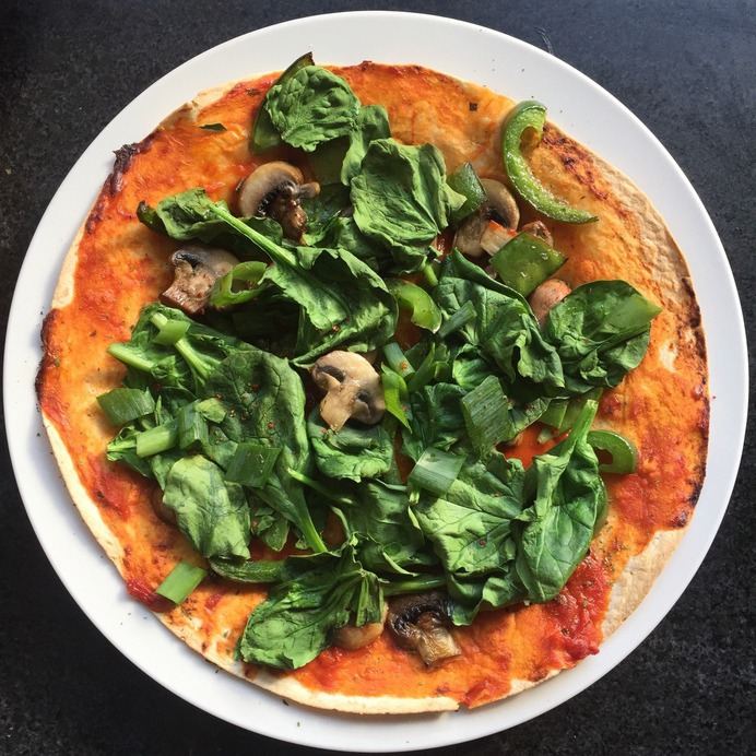 Another tortilla pizza with mushrooms, peppers, spinach and chilli flakes.
