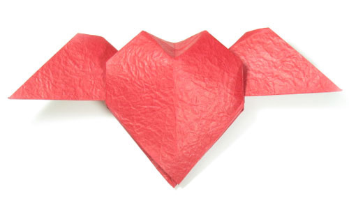 How to make an origami heart with wings (http://www.origami-make.org/howto-origami-heart.php)