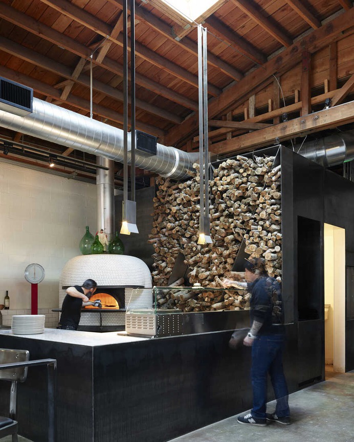 Bruciato, a Contemporary Pizzeria Occupies a Former Hardware Store