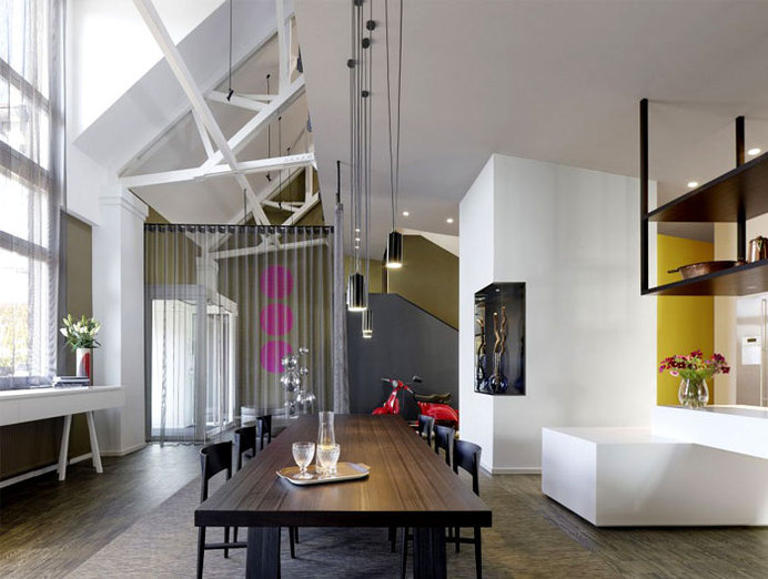Loft ESN an Exceptional Transformation into Spacious Living Space long dining table vibia lighting #interior #design #decor #home