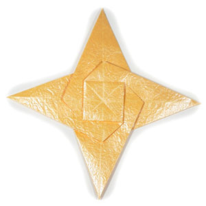 How to make a four-pointed seashell origami star (http://www.origami-make.org/howto-origami-star.php)