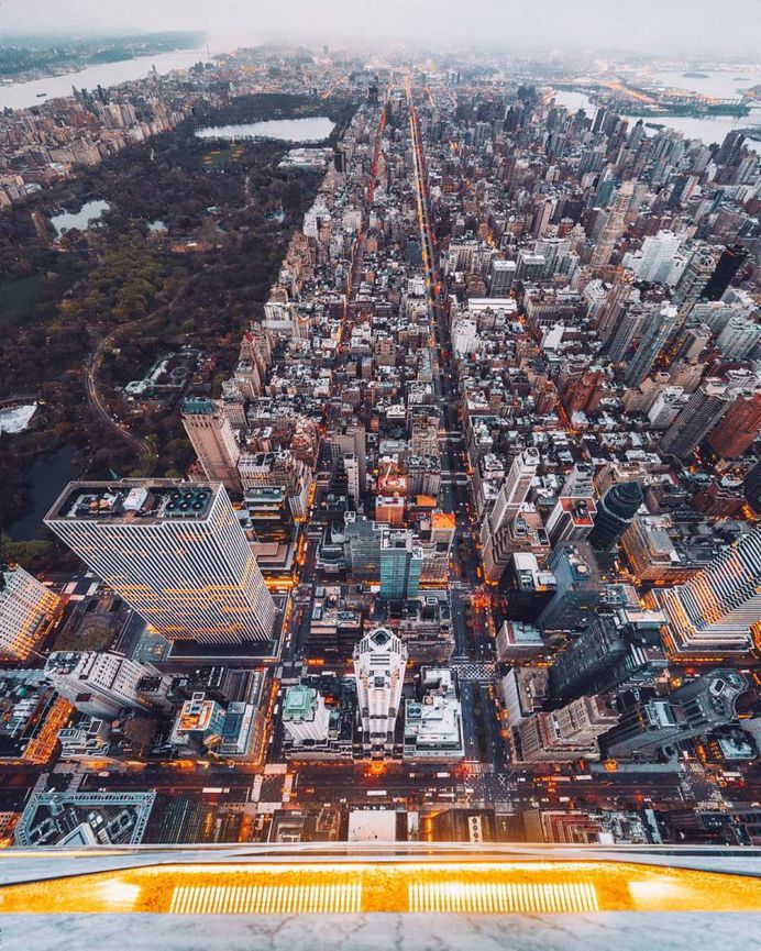 Daredevil Photographer Denis Krasnov Climbes Huge Skyscrapers To Take Stunning Photos