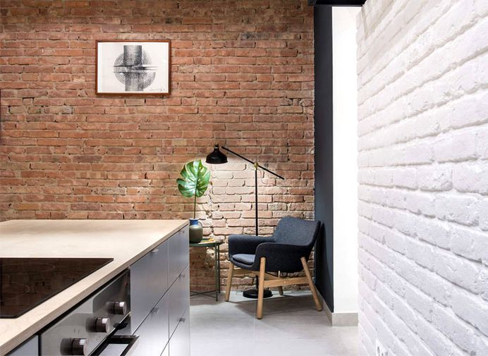 Apartment Renovation with Industrial Accents in Budapest - InteriorZine