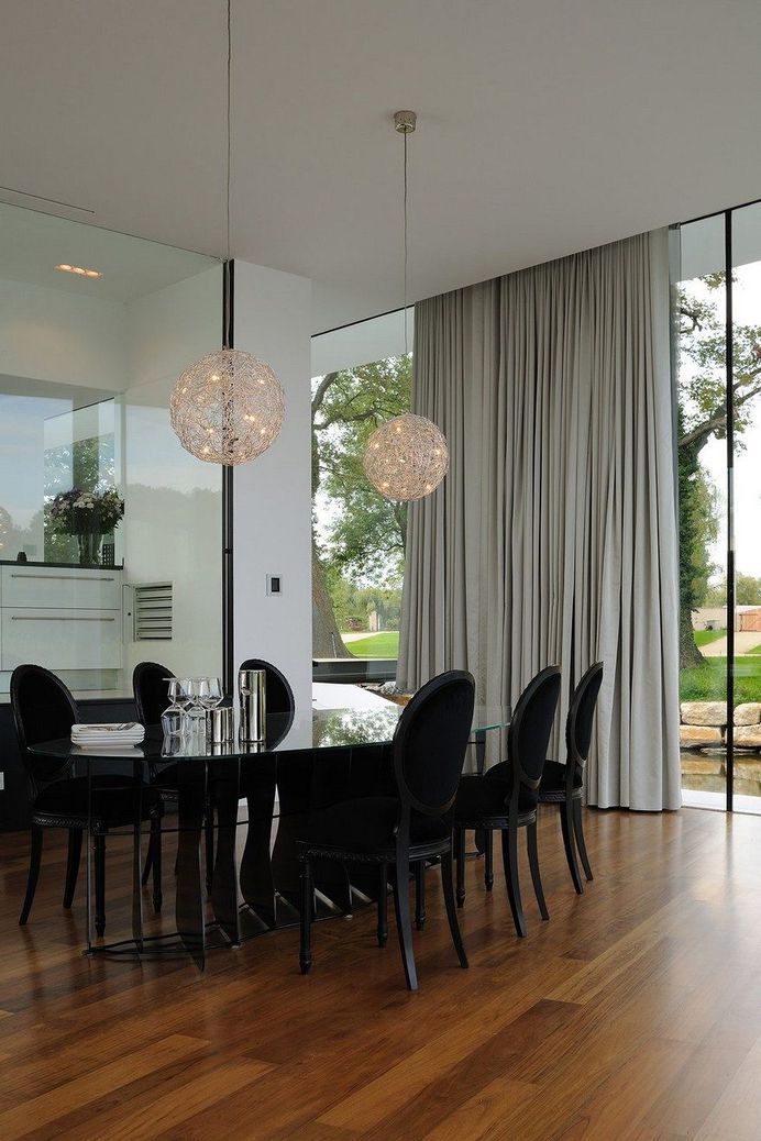 Concrete and Glass Residence Built on the Surface of a Lake: White Snake House 10