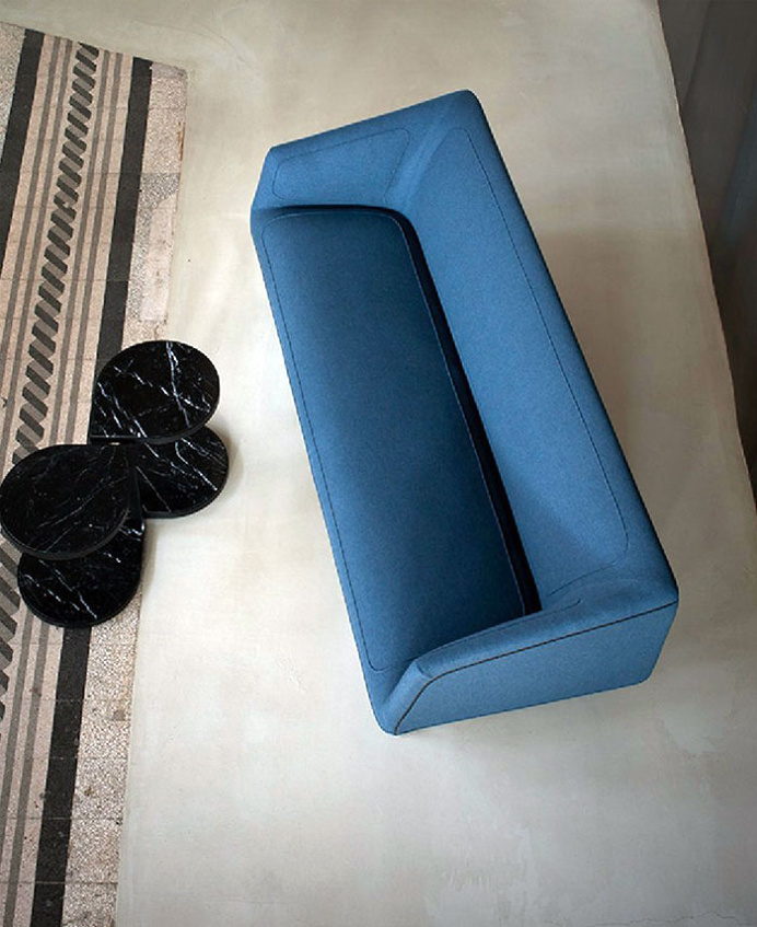 Couch Clothed in Cushions