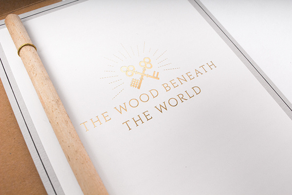 The Wood Beneath The World on Behance #stamp #branding #invitation #embossed #wood #trees #identity #envelope #gold #stationery #programme #ticket #foil #keys