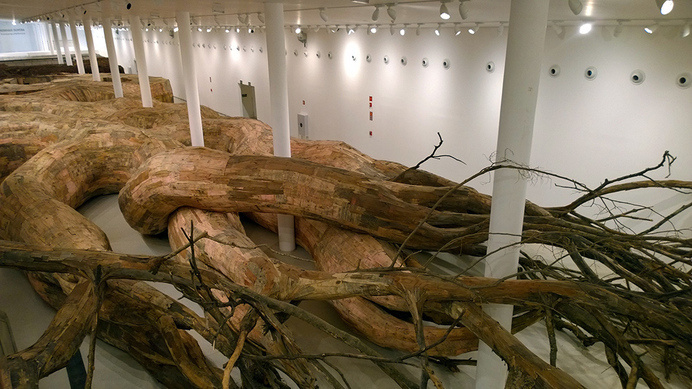 Henrique Oliveira Constructs a Cavernous Network of Repurposed Wood Tunnels at MAC USP #wood #instillation