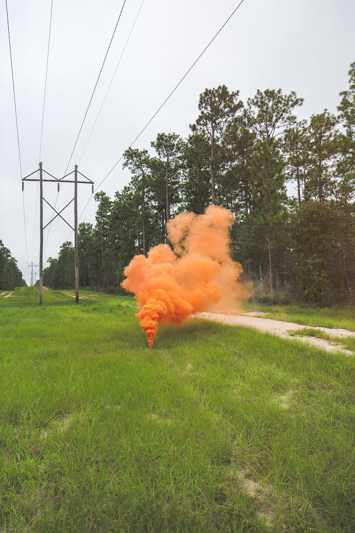 "colorful smoke in european landscapes"