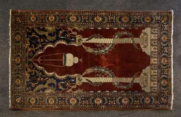 Oriental rug made of silk. 1. Half of the 20. Century, approx. 143x92 cm