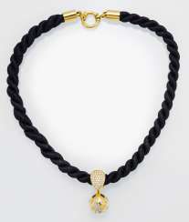 Diamond pendant with cord chain