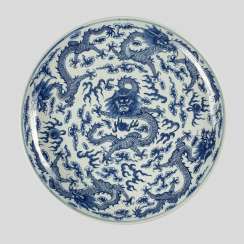 A large underglaze-blue decorated 'Nine dragons'-porcelain plate #Sets #Teasets #Porcelainsets #Antiqueplates #Plates #Wallplates #Figures #Porcelainfigurines #porcelain