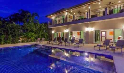 7-bedrooms Expansive Villa is the closest to Nai Harn Beach, Phuket, offers private pool, gym, maid service, kitchen, AC & more amenities. Call VillaGetaways to book
