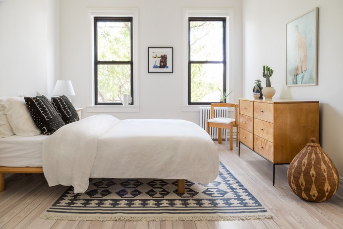 A plywood side chair in A Buzzfeed Founder's Renovated Rowhouse, Budget Edition was an eBay score. Photograph courtesy of White Arrow.