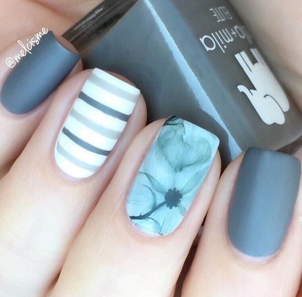 Classy nail manicure with stripes and floral pattern