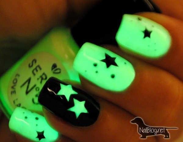 Revel in neon green glow in the dark of stars plus a striking background and silhouettes of black.