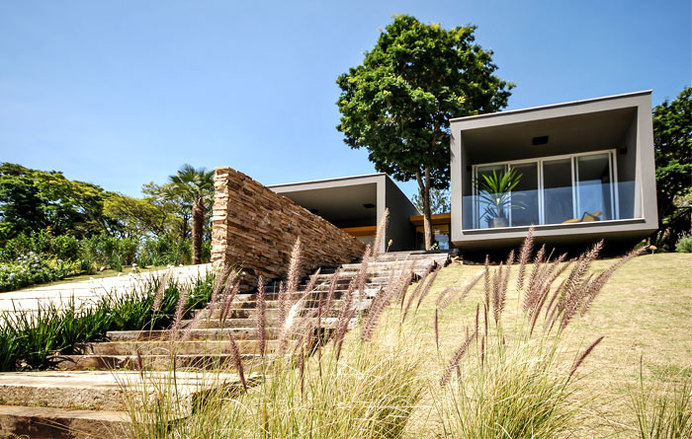 Brazilian House with Stylish Architecture and Rustic Materials two front facade cubes #house #design #dream #home #architecture