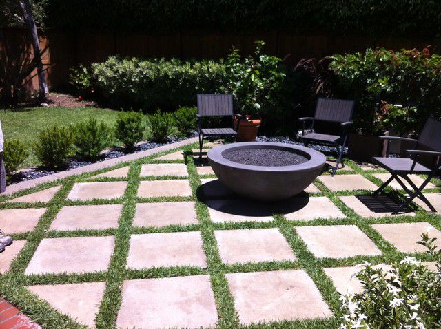 Outdoor Fire Pit with Concrete/Grass Pavers modern-patio
