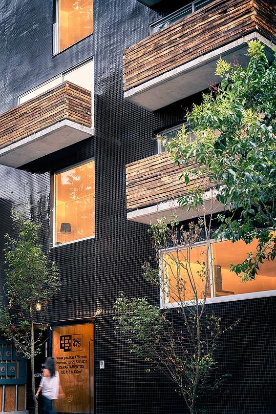 This Apartment Building Has a Black-Reflective Square-Shaped Facade