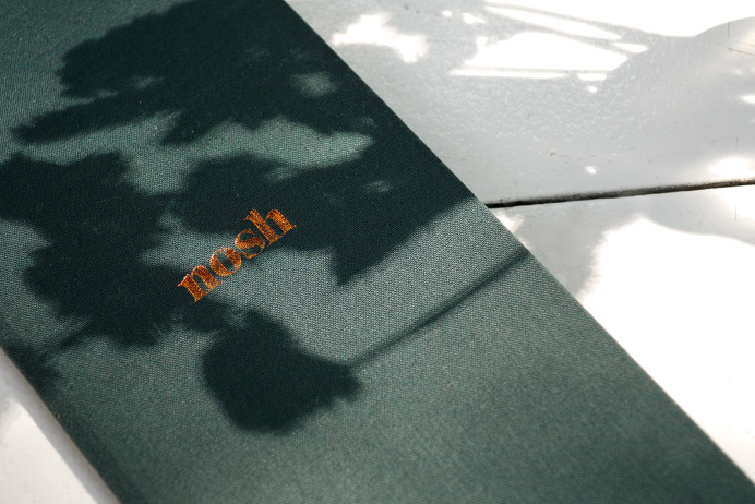 Nosh restaurant corporate design logo logotype branding identity deluxe luxury bar by Darling Visual Communications singapore mindsparkle ma