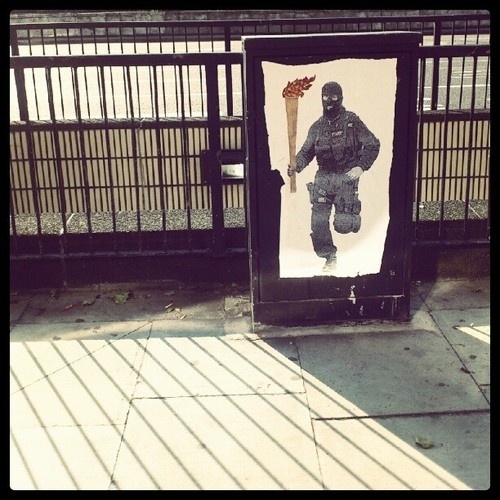Wall-B World Wild #looting #torch #london #art #street #flame #olympics