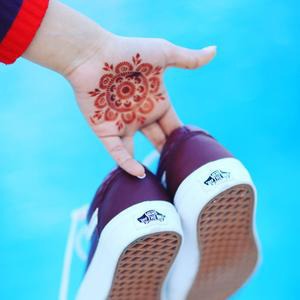 Passion Fruit - mandala henna design on palm Tropical and tasteful, Mihenna's mandala henna design includes a variety of ring styles to complete this fun look that you can do yourself, no experience needed.