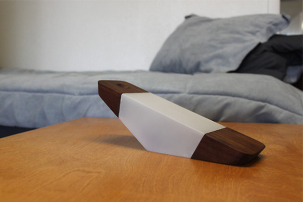 The Prism Nightlight is an interactive tilt activated light that balances minimalistic designs and playful attitudes for an interactive expe #interactive #modern #design #home #product #industrial #nightlight #light