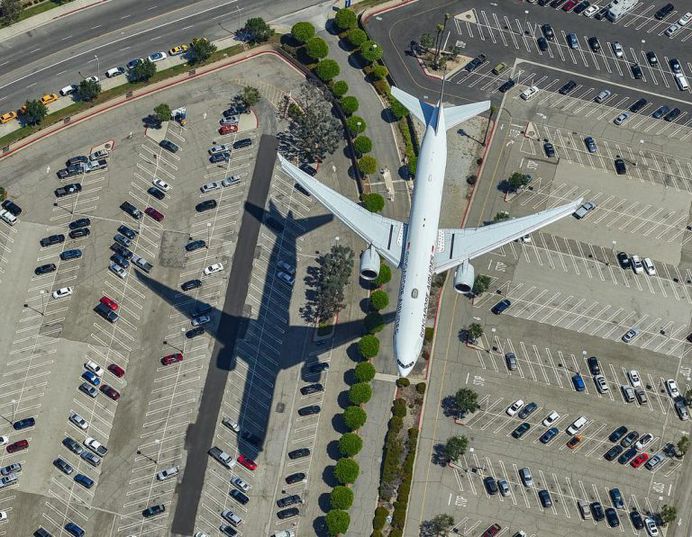 Daredevil Photographer Jin-Woo Prensena Hangs Out of Helicopters to Take Spectacular Aerial Photos