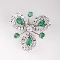 Vintage emerald and diamond brooch in clover leaf shape