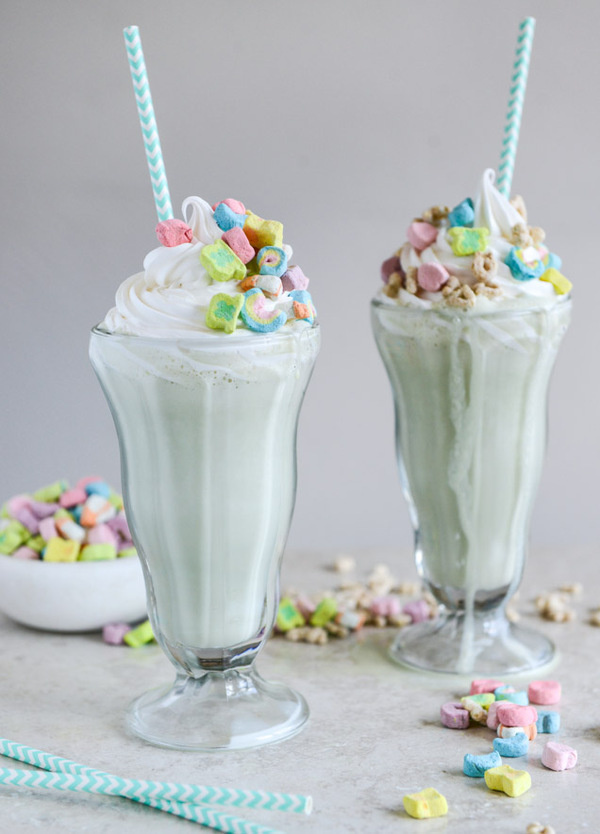 Boozy Lucky Charms Cereal Milkshakes with Marshmallow Frosting I howsweeteats.com #luckycharms #milkshake #drink #sweet #cereal #green