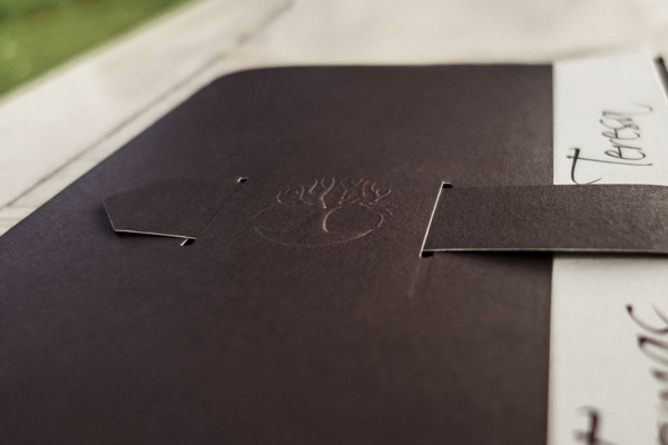 A brand for Tomas and Teresa's wedding. on Behance #wedding #favini crush #logo design #tree #heart #hidden message #relief print #book