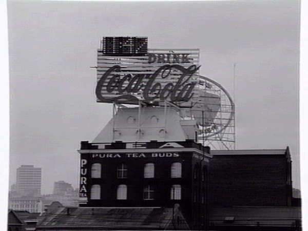 [Coca-cola sign and clock above Pura Tea Buds building, South Melbourne] [picture] , State Library of Victoria #coke #photography #coca #cola