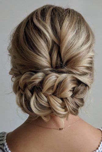Updo hairstyles for brides look so pretty and graceful. They are definitely suitable for the great atmosphere of a wedding day.