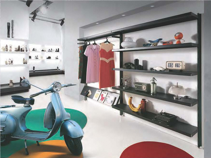 Caimi | Big shop | Monnalisa |Text | Socrate Big shop design Marc Sadler, Premio XXI Compasso d'Oro Ideata quasi come un componente arch
