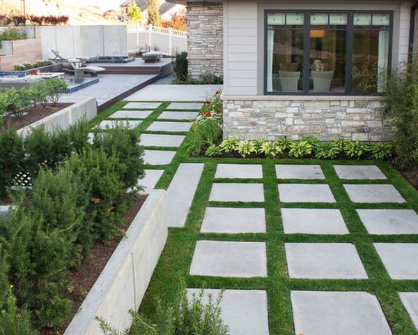 Elegant Pavers And Grass Patio