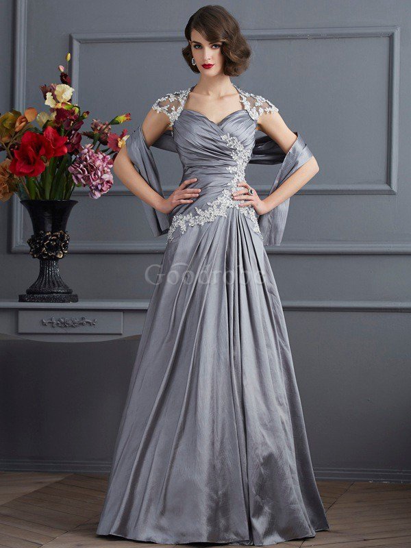Robe de soirée longue ligne a fermeutre eclair avec manche courte decoration en fleur