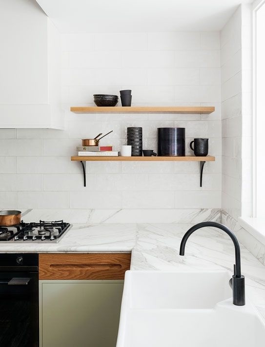 Kitchen with black and brass detail. Park View House by Arent&Pyke. Photo by Felix Forest. #kitchen #parkviewhouse #arentandpyke