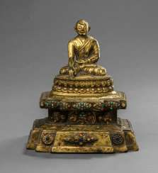 Fine fire-gilt Bronze of a Lama on a throne