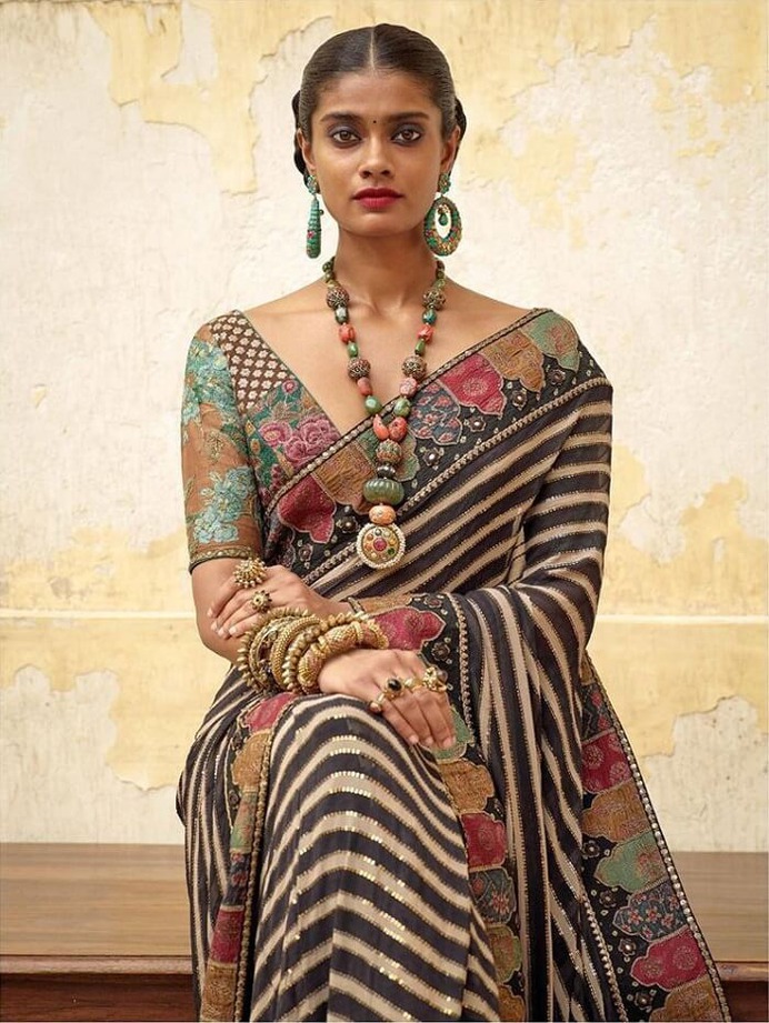 Saree with gold jewelry
