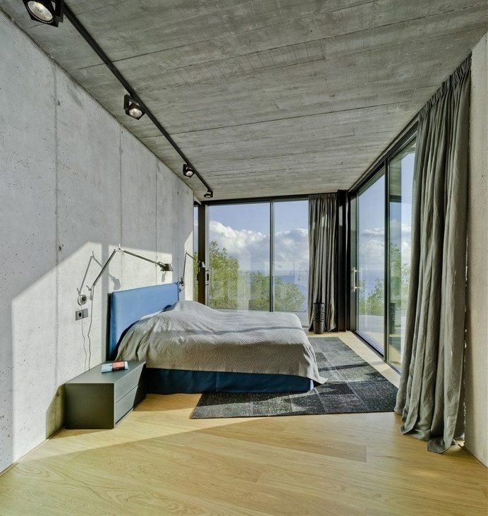 Concretus House is a Brutalist-Style Home in Cala Sardinera, Spain 11