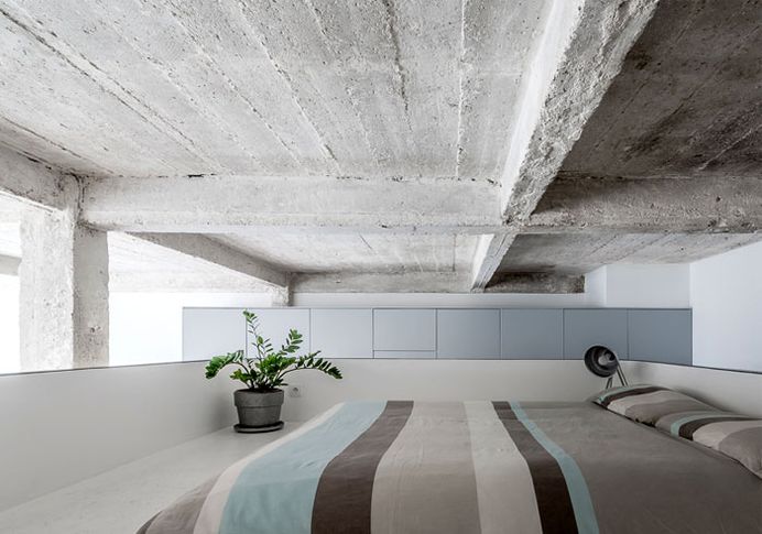 Perforated Aluminum Island at Parisian Apartment by SABO Project - InteriorZine