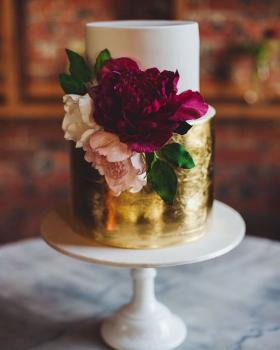 Gold foil and fresh flowers wedding cake,