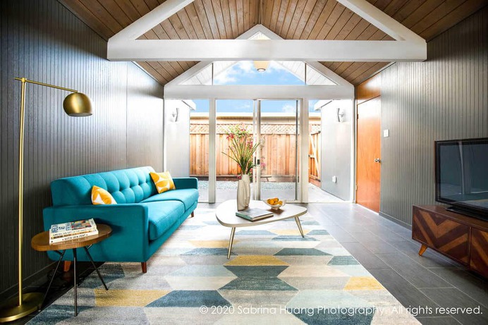 living room by Klopf Architecture