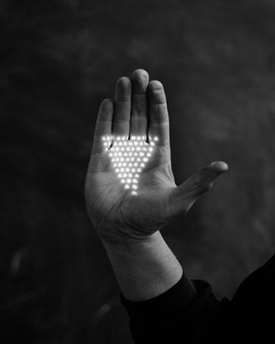 james henkel photographs | Design For Mankind #white #hand #black #dots #photography #triangle #light #shadow