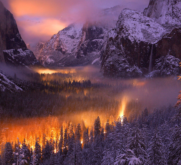 Yosemite Valley at Dusk: A mist had settled over Yosemite Valley, as automobiles passed through, headlights illuminated the fog. (© Phil Ha #national #yosemite #geographic