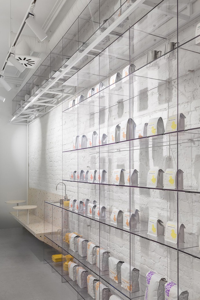 Bolshecoffee Roasters & Shop by AKME - Mindsparkle Mag Bolshecoffee Roasters is a minimalist space in a historic building in the center of St. Petersburg, Russia. The project was developed by the architectural bureau AKME. #interior #architecture #identity #branding #design #color #photography #graphic #design #gallery #blog #project #mindsparkle #mag #beautiful #portfolio #designer