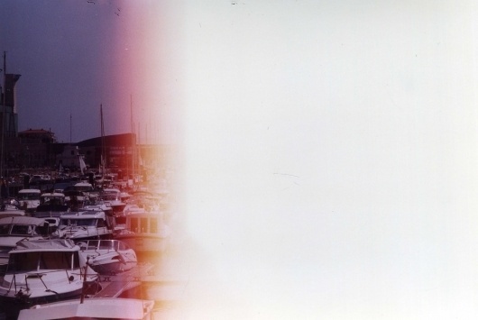 Arch MCX #white #boats #burn #yellow #photography #film #blue #light
